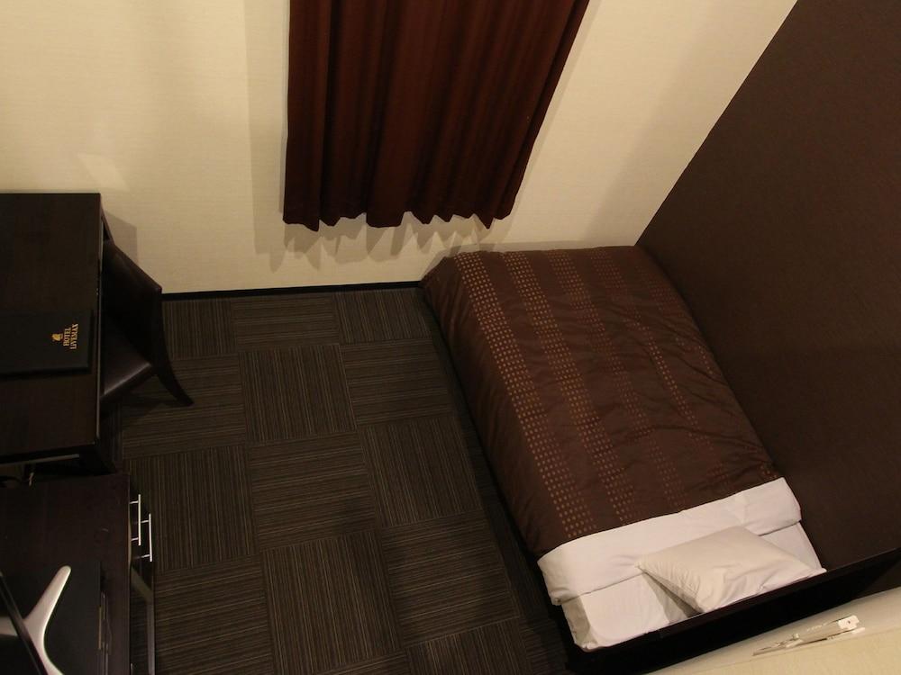 HOTEL LiVEMAX BUDGET Esaka Suita Eksteriør billede